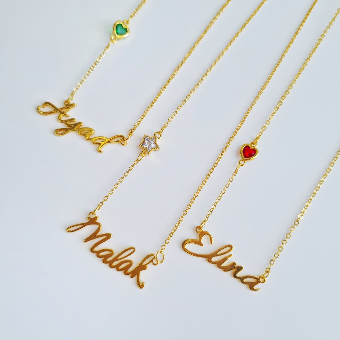 Arabic calligraphy 18K gold plated name necklace with custom charms | عقد اسم مخصص بخط عربي ومطلية بالذهب مع تعليقة من اختيارك