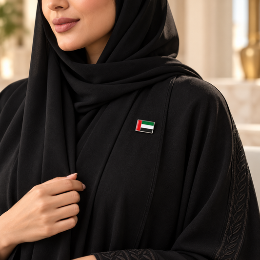UAE flag magnetic pin on a black abaya – what to wear on UAE National Day