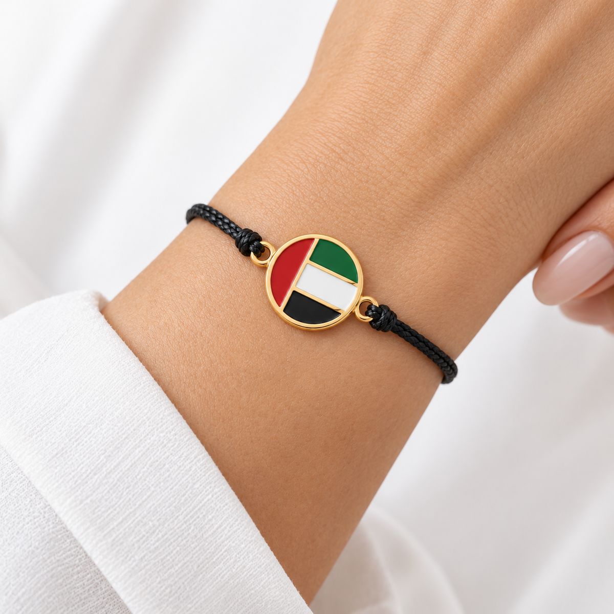 UAE flag black cord bracelet — gold finish, woman — generated product styling
