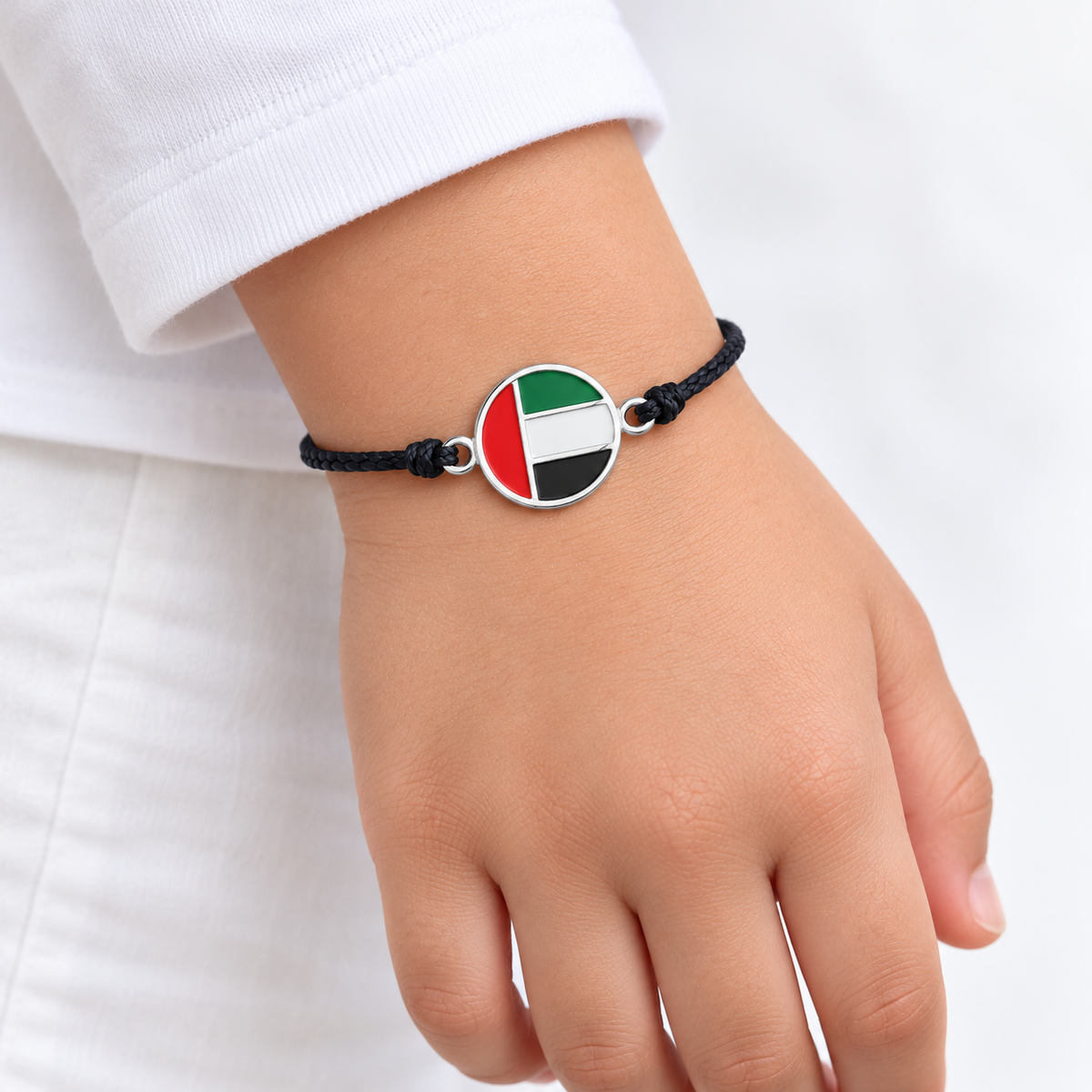UAE flag cord bracelet — silver finish, child — generated styling image
