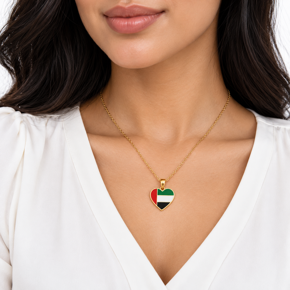 UAE flag heart necklace — gold finish, woman — generated product styling