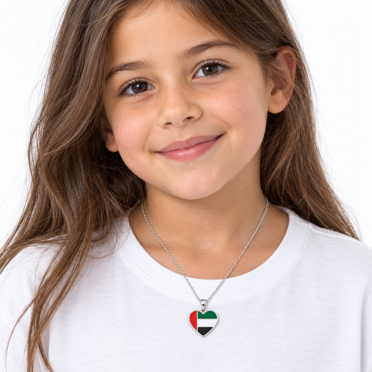 UAE flag heart necklace — silver finish, child — generated styling image