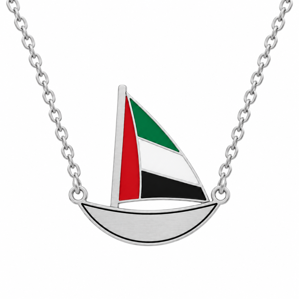 Approved Little Sail flat laser-cut UAE flag dhow necklace in silver finish, thin black enamel hull outline, on white background