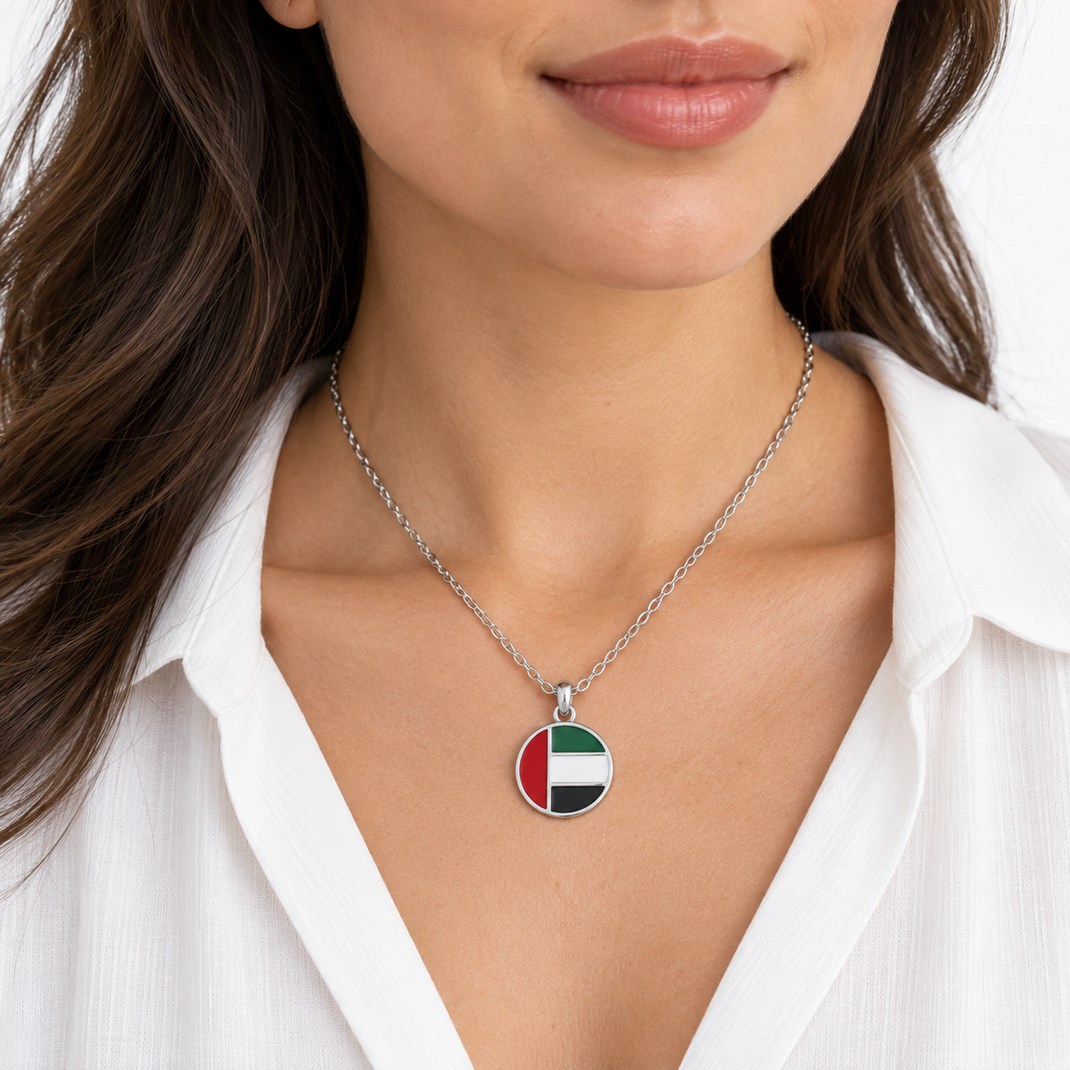 Round UAE flag necklace — silver finish, woman — generated styling image