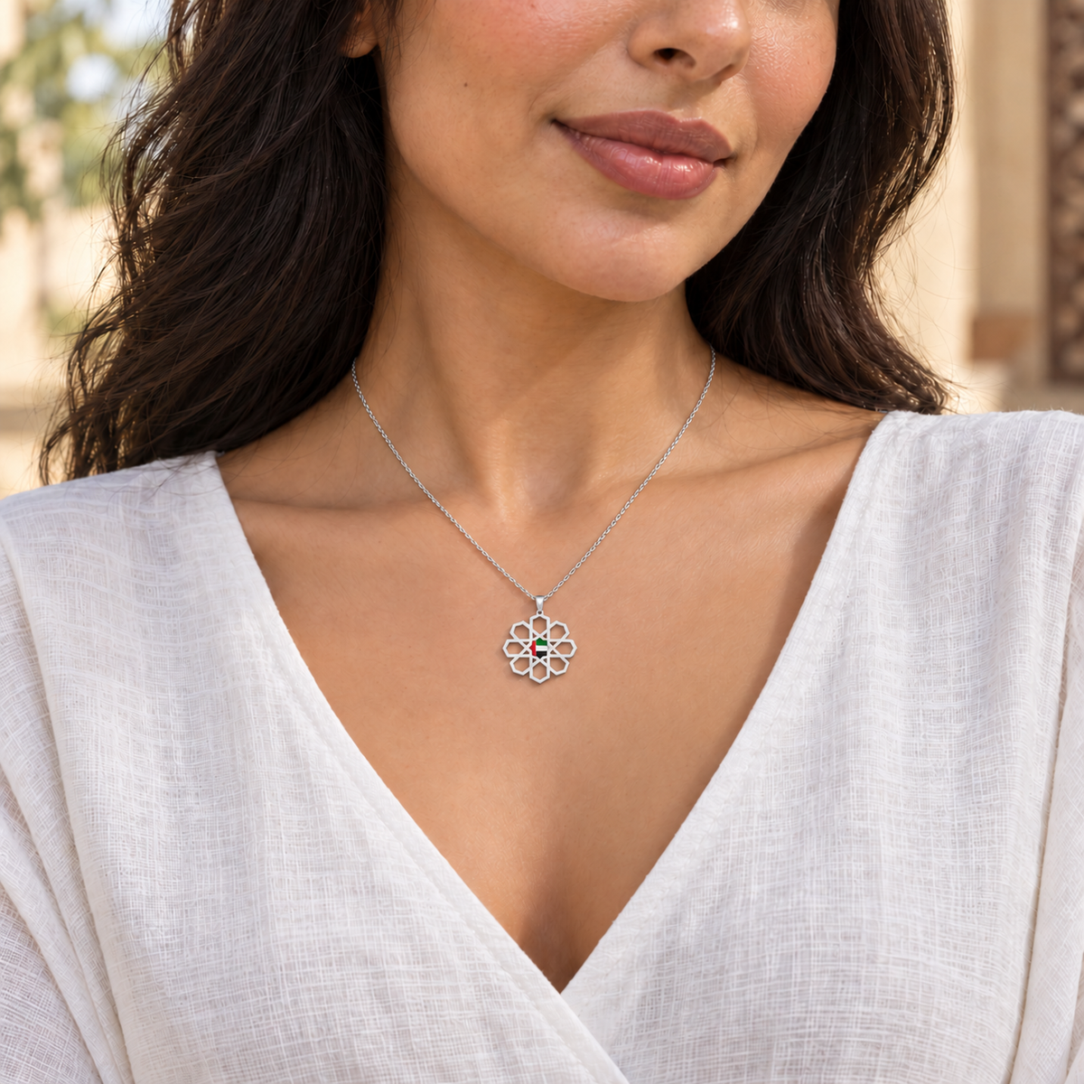 Woman wearing delicate 2 cm UAE Arabesque Star necklace in silver finish — generated styling image